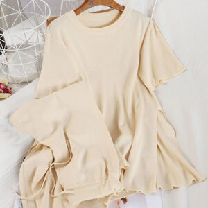 Легкий молочний трикотажний костюм, подовжений верх та кюлоти