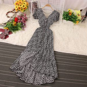 Сукня з відкритою спиною чорна в дрібний квітковий принт