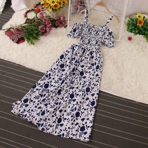 Сукня міді з відкритими плечима в синій принт