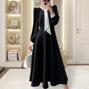 Сукня міді чорного кольору з білим комірцем та манжетами