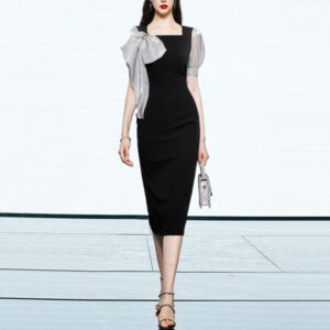 Сукня футляр чорного кольору оздоблена бантом з органзи