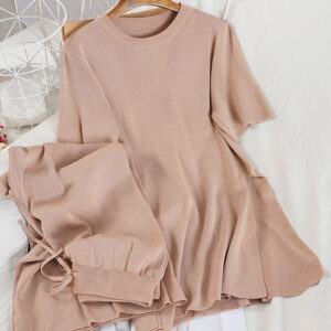 Легкий бежевий трикотажний костюм, подовжений верх та кюлоти